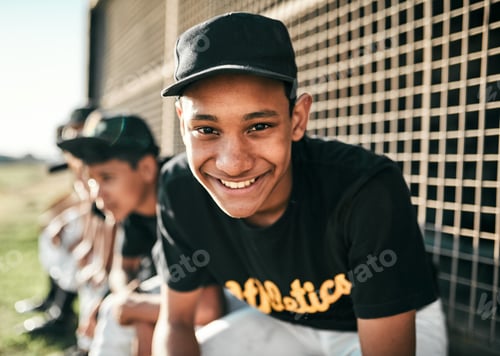 Preview: I play for the fun of it. Portrait of a young baseball player sitting on a baseball field.
