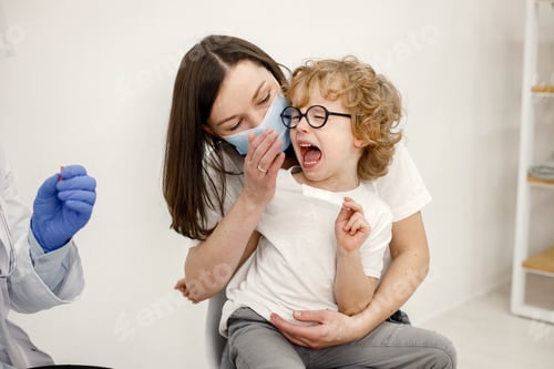 Preview: Little boy screaming because doctor is going to do vaccination