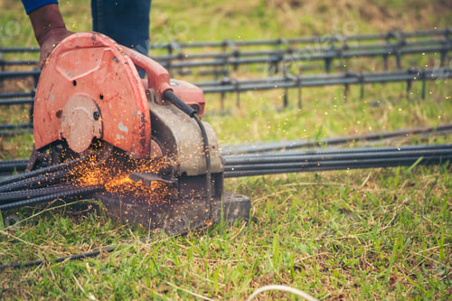 Preview: Construction Worker hands using Welding machinery iron metal sparking. Men hands protective glove