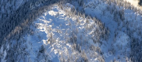 Preview: Aerial Panoramic View of Canadian Mountain covered in snow