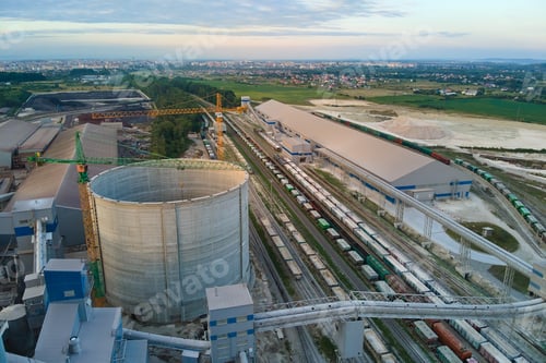 Preview: Aerial view of cement factory under construction with high concrete plant structure