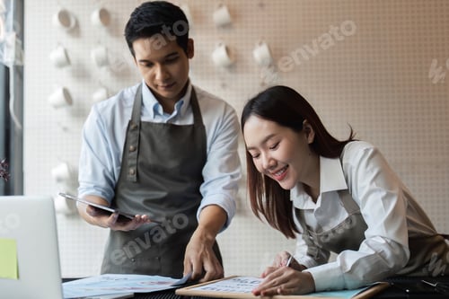 Preview: Baristas collaborating on promotional ideas for their cafe