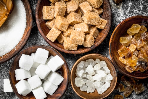 Preview: Different kinds of sugar in bowls.