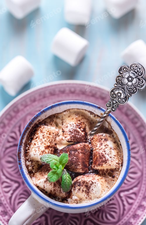 Preview: Cup of cocoa with marshmallows and cocoa powder