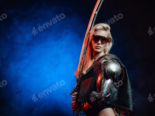 Preview: Seductive woman with sunglasses and sword in dark background