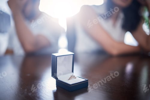 Preview: Are we still going through with this. Shot of a ring in a box on a counter at home.