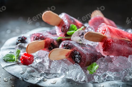 Preview: Homemade ice cream with berries on cold ice