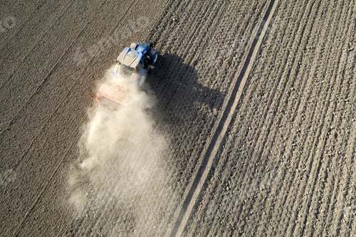 Preview: Aerial view of a tractor in the moment of sowing