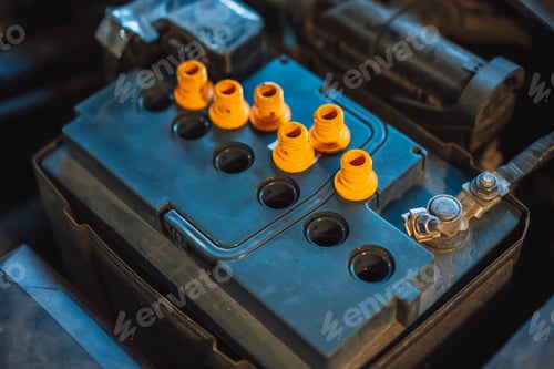 Preview: Car battery in car with plugs removed