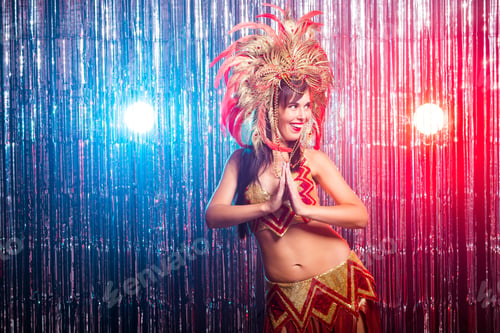 Preview: Carnival, belly dance and holiday concept - Beautiful female samba dancer wearing gold costume and