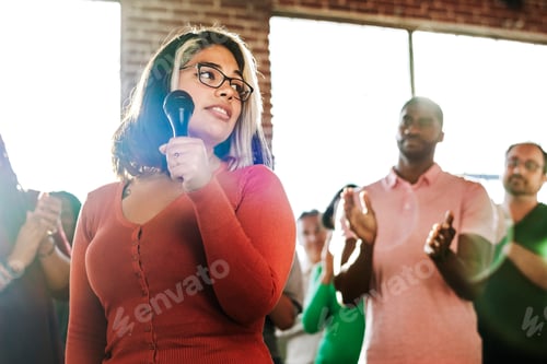 Preview: Woman holding a microphone