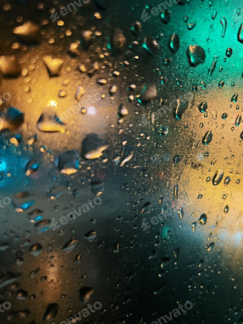 Preview: Raindrops on a window close up
