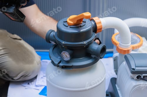 Preview: Detailed view of pool filter system installation in home setting during daytime