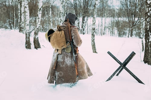 Preview: Re-enactor Dressed As World War II Russian Soviet Red Army Soldier Marching Through Snowy Winter