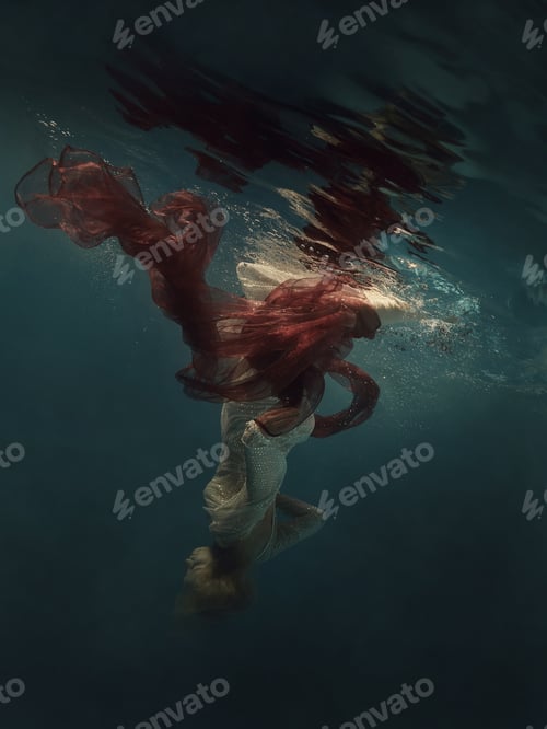 Preview: Portrait Of A Woman In A Dress Underwater