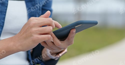 Preview: Woman use of smart phone at outdoor