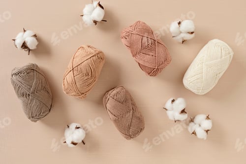 Preview: Craft knitting hobby background with yarn in natural colors