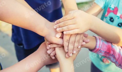 Preview: hands of children, many friends, games. Selective focus