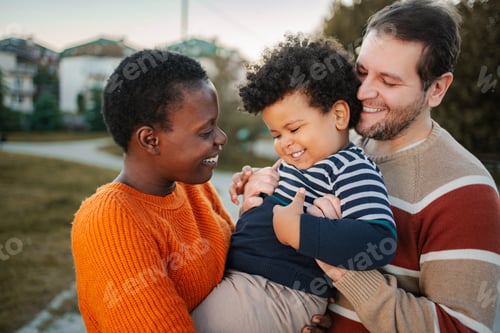 Preview: Parents bonding with happy baby son