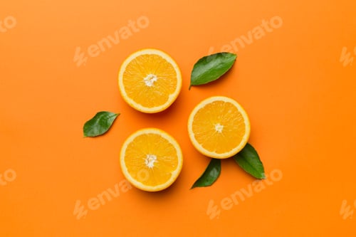 Preview: Fruit pattern of fresh orange slices on colored background. Top view. Copy Space
