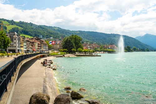 Preview: Scenic lakeside promenade on a bright sunny day