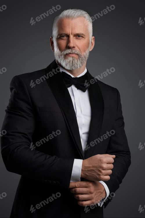Preview: The distinguished old man stands confidently in a black suit