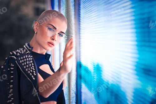 Preview: Beautiful woman illuminated by led lights