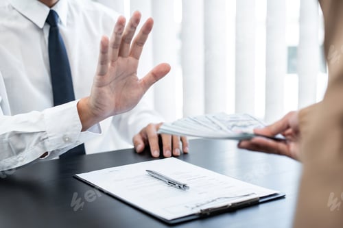 Preview: Businessman is refuses to accept banknote money and terms of contract from bribe employer