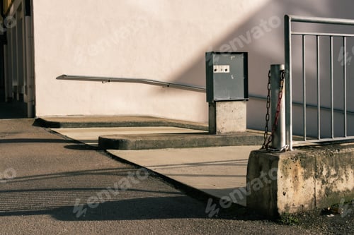 Preview: Entrance to the underground parking lot on a sunny day with contrasting shadows