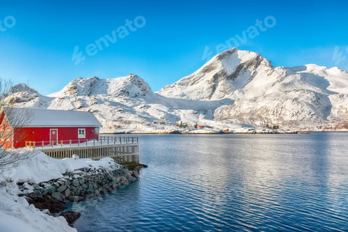 Preview: Amazing winter view of village on Sundstraumen strait that separates Moskenesoya and Flakstadoya