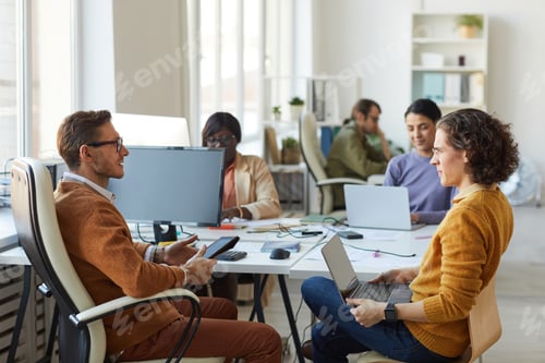 Preview: Male Business Manager Talking to Employee