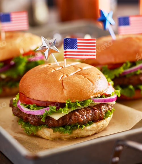 Preview: patriotic burger with american flag for 4th of july picnic close up