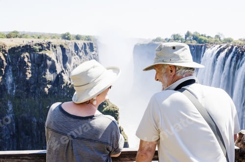 Preview: Couple looking out to Victoria Falls, Zambia