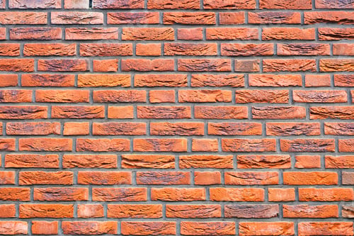 Preview: Brick wall as a background. Old brick on a retro house. Abstract composition for the design.