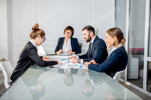 Preview: Business people during the conference in the office