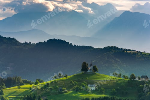 Preview: Lonely Church Stand Out on Hilltop in Alpine Landscape. Sveti Tomaz in Slovenia