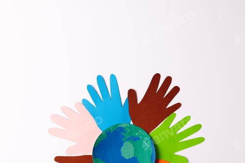 Preview: Paper cut out of multi coloured hands and globe with copy space on white background