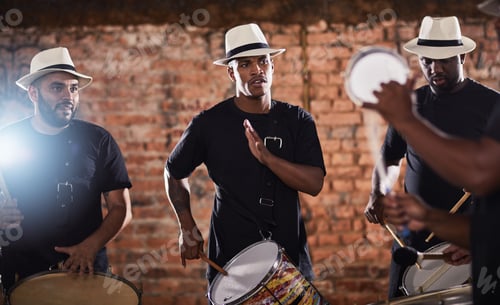 Preview: Shot of a group of musical performers playing together