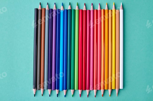 Preview: Set of sharp crayons on color background.