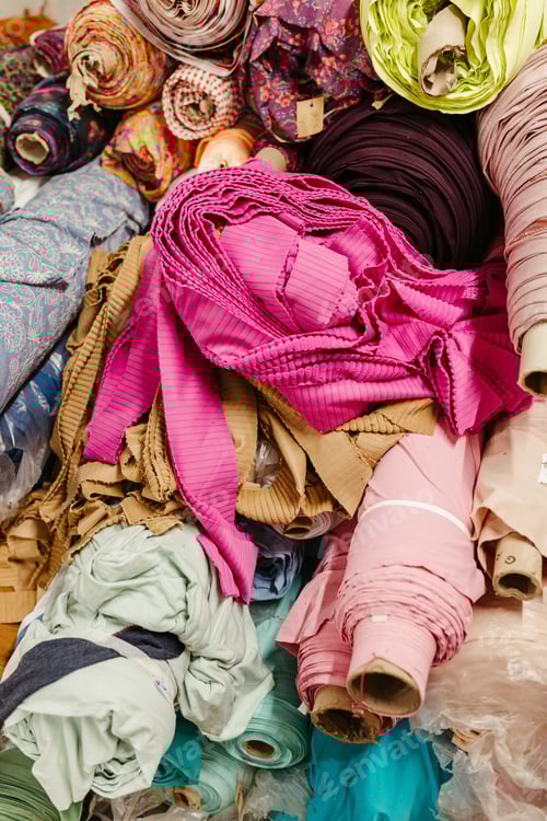 Preview: Rolls of Fabric Material in a Workshop