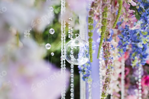 Preview: Details of the wedding ceremony made of fresh flowers, sparkling beads.