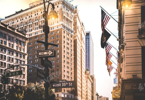 Preview: Street signs between Broadway and West 35th St at sunset in New York City