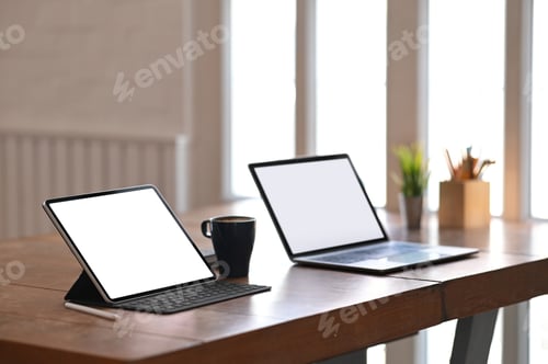 Preview: Photo of white blank screen computer putting on wooden table together.