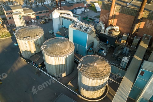 Preview: Aerial view of big fuel reservoirs in petroleum industrial zone and metal exhaust pipes