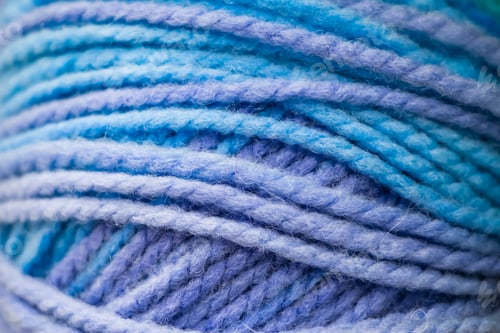 Preview: Close-Up of Soft Blue and Purple Yarn