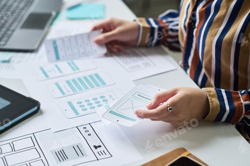 Preview: Woman Designing Mobile Application User Interface Layout