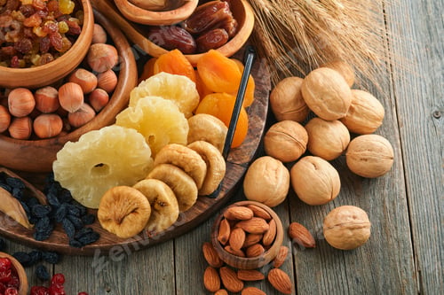 Preview: Tu Bishvat celebration concept. Mix of dry fruits and nuts almonds, hazelnuts, walnuts, apricots, pr