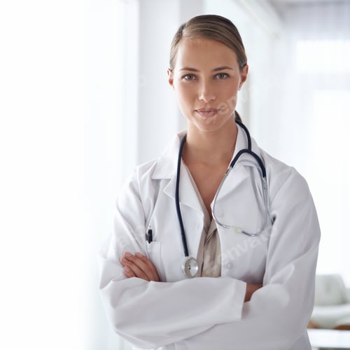 Confident Woman Doctor With Stethoscope in Hospital