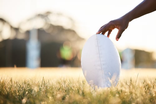 Preview: Sports, rugby and hand of person with ball ready for game, competition and tournament outdoors. Fit