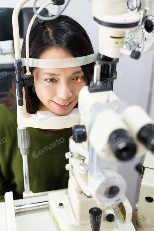 Preview: Woman having eye examination